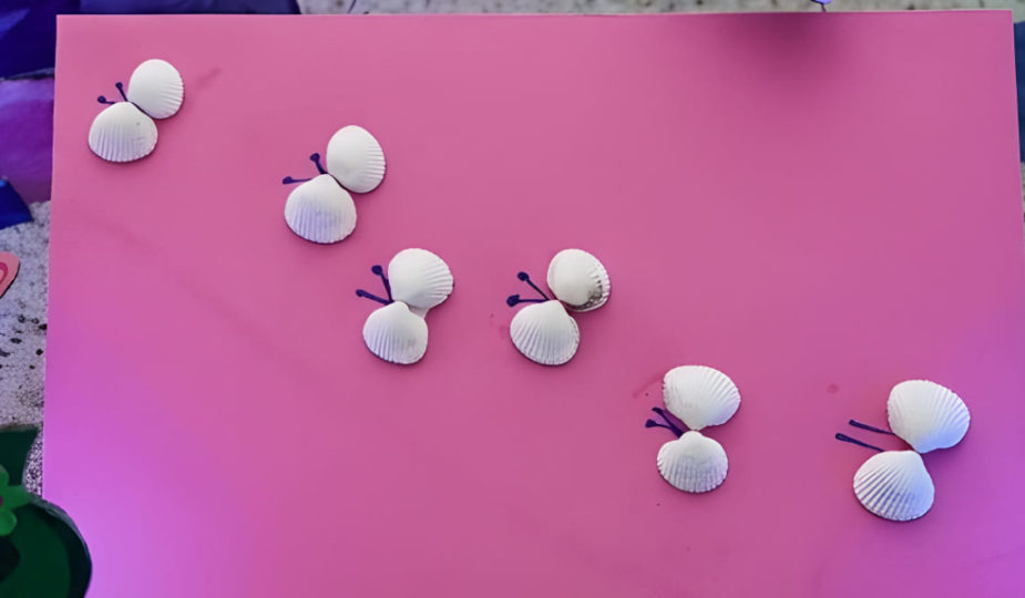 création l'envolée des papillons avec des coquillages de vacances
